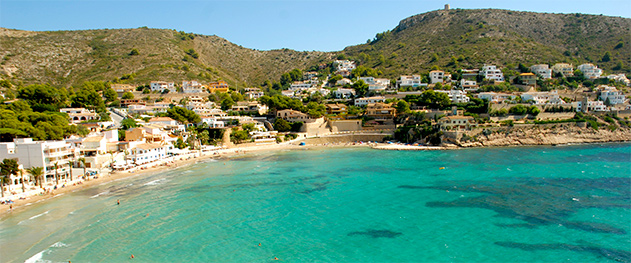 Abahana Villas - Playa de El Portet con torre de Cap d'Or.