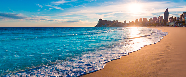 Abahana Villas - Playa de Poniente al atardecer.